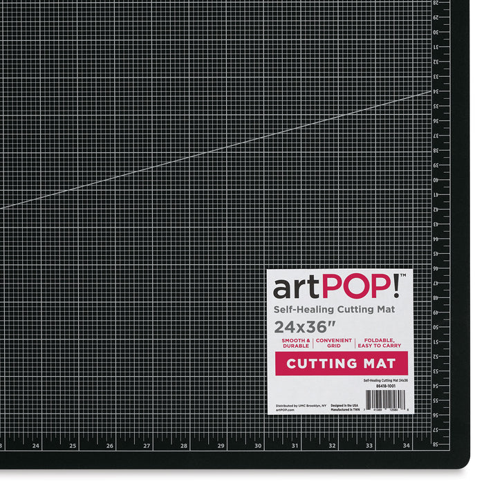 artPOP! Self-Healing Cutting Mat - 24" x 36", Foldable (Close-up of bottom right corner and label)